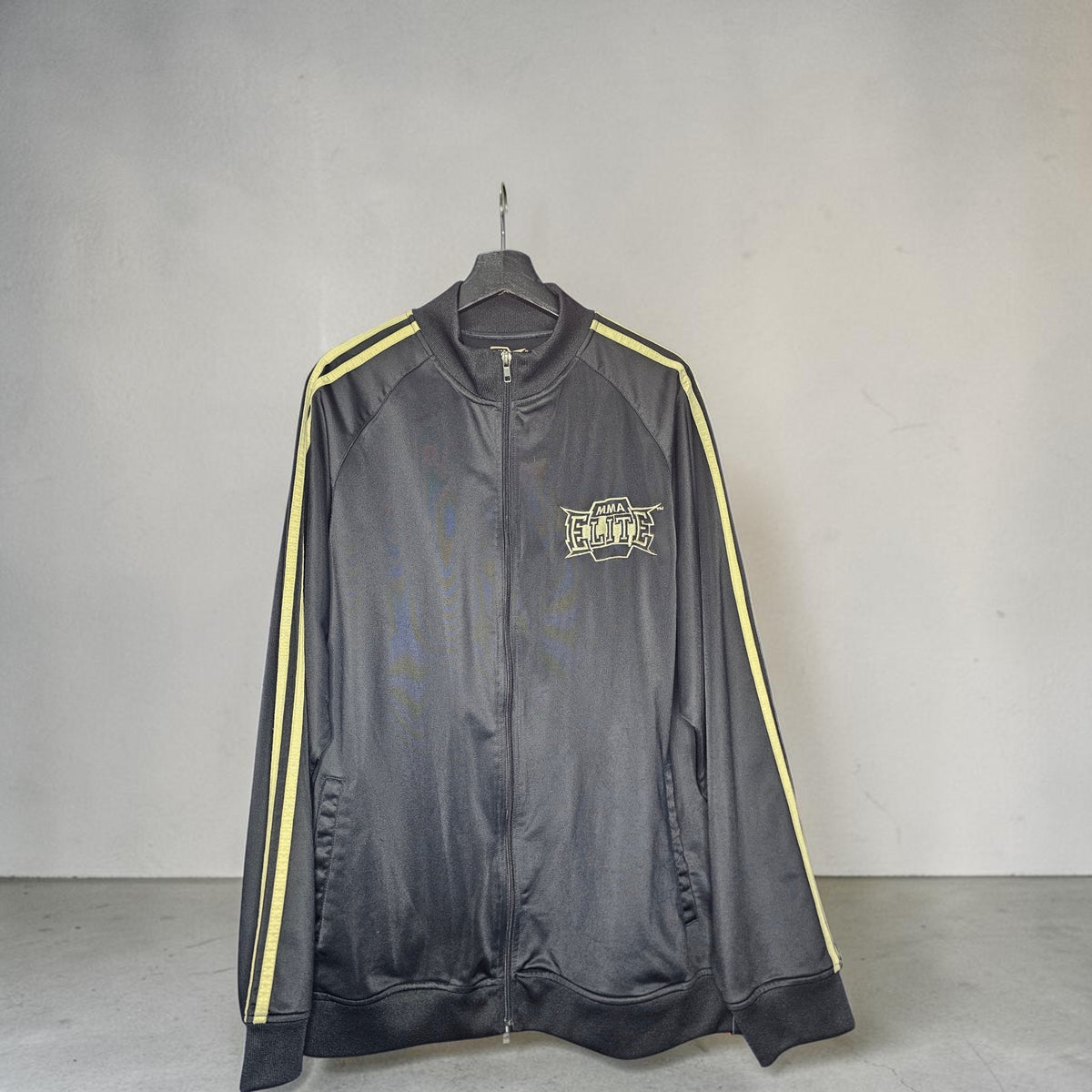 Y2K MMA Elite skull wing black gold graphic track jacket