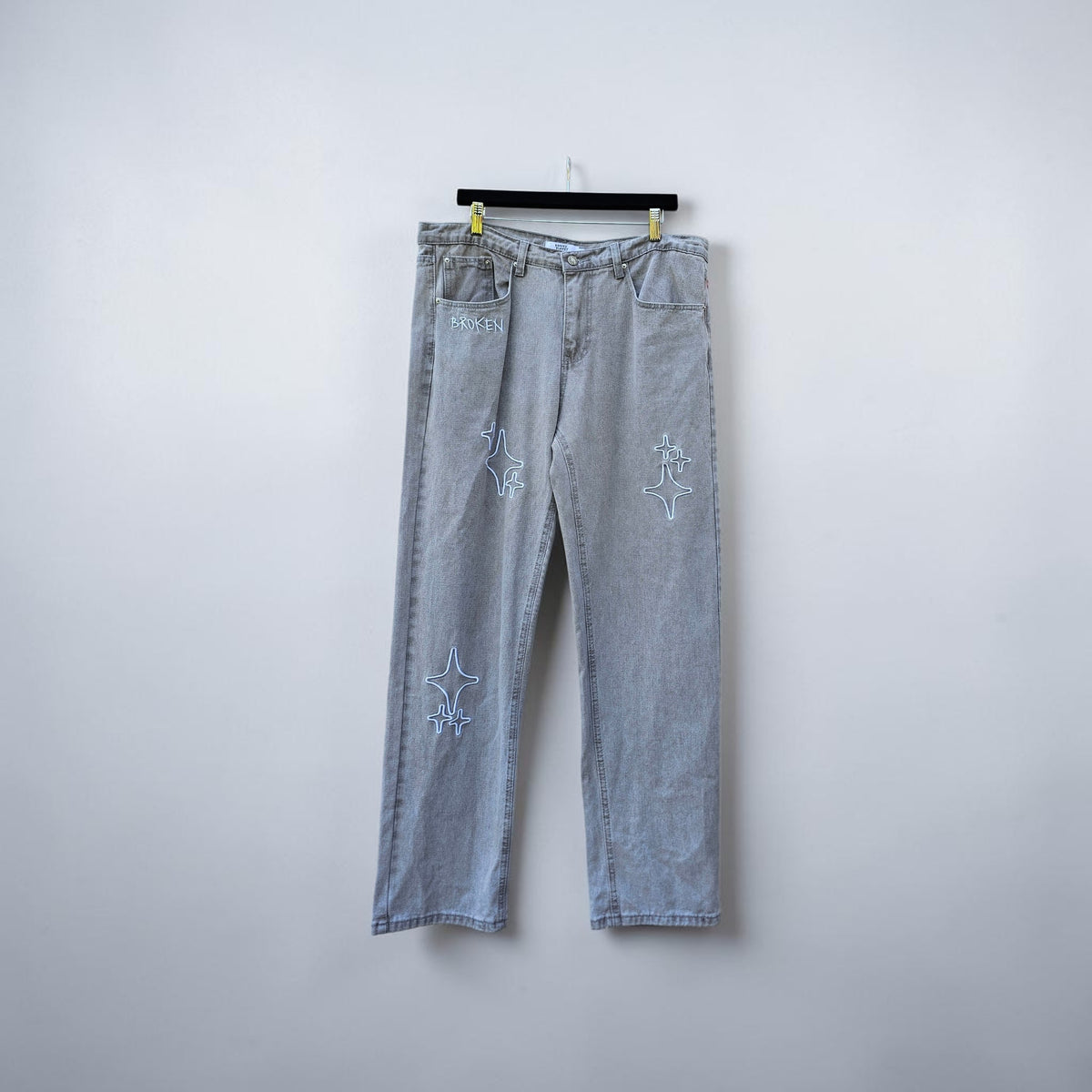 Broken planet market white embroidered patch washed grey denim pants