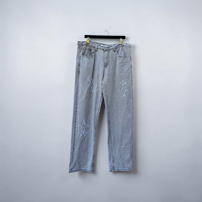 Broken planet market white embroidered patch washed grey denim pants