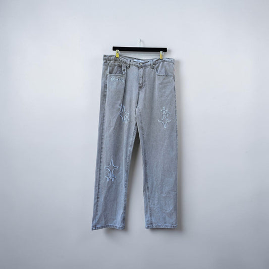 Broken planet market white embroidered patch washed grey denim pants